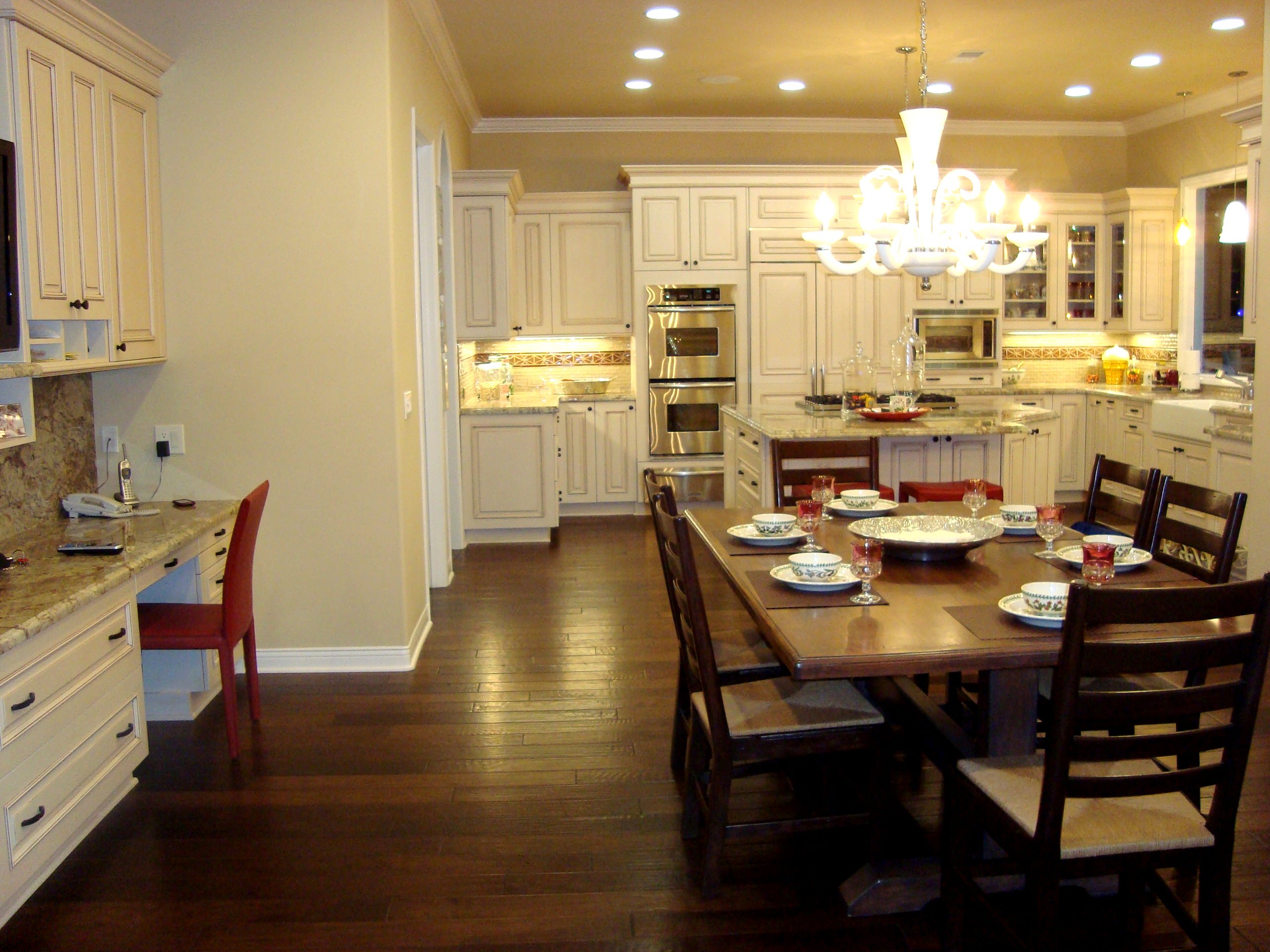 The Nolan Kitchen In Brookhaven Cabinetry, and adjacent desk/office area.
