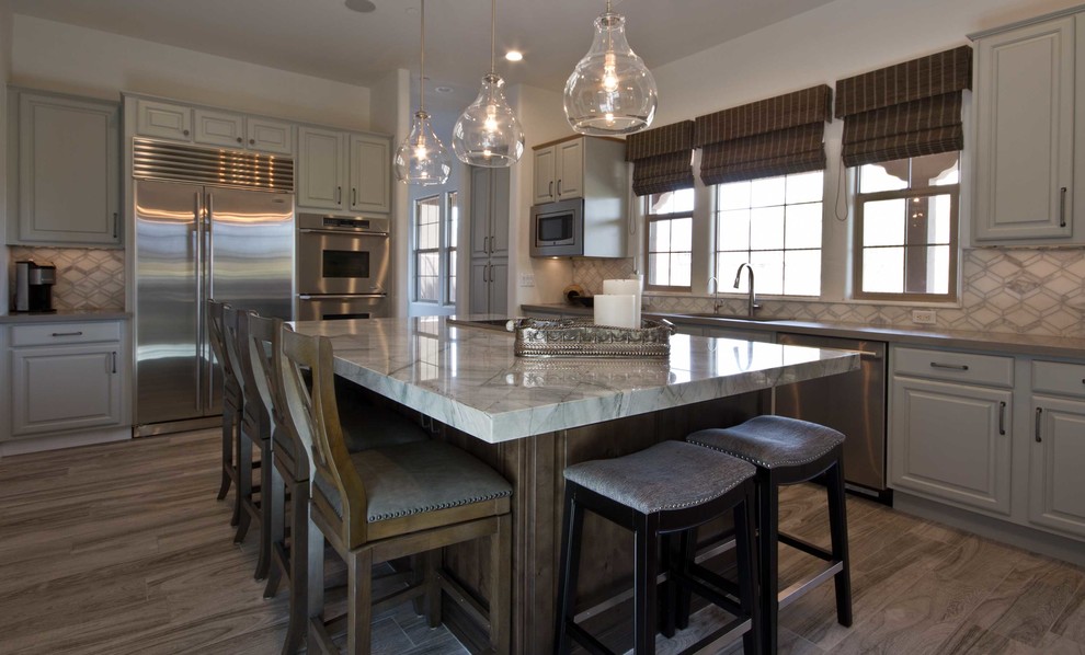 Example of a transitional kitchen design in Phoenix