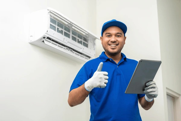 man checking on AC