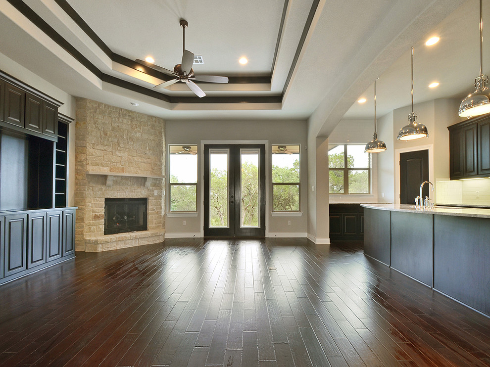 This is an example of a traditional family room in Austin.