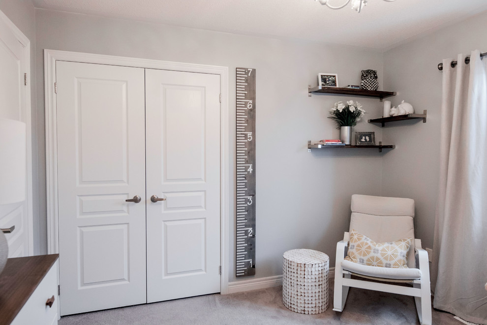 Example of a transitional nursery design in Toronto