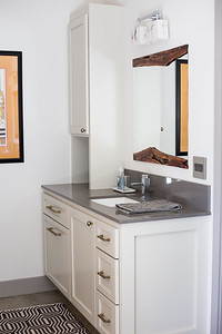 Example of a mid-sized mountain style master gray tile and subway tile concrete floor and gray floor freestanding bathtub design with shaker cabinets, white cabinets, a two-piece toilet, an undermount sink, granite countertops and a hinged shower door