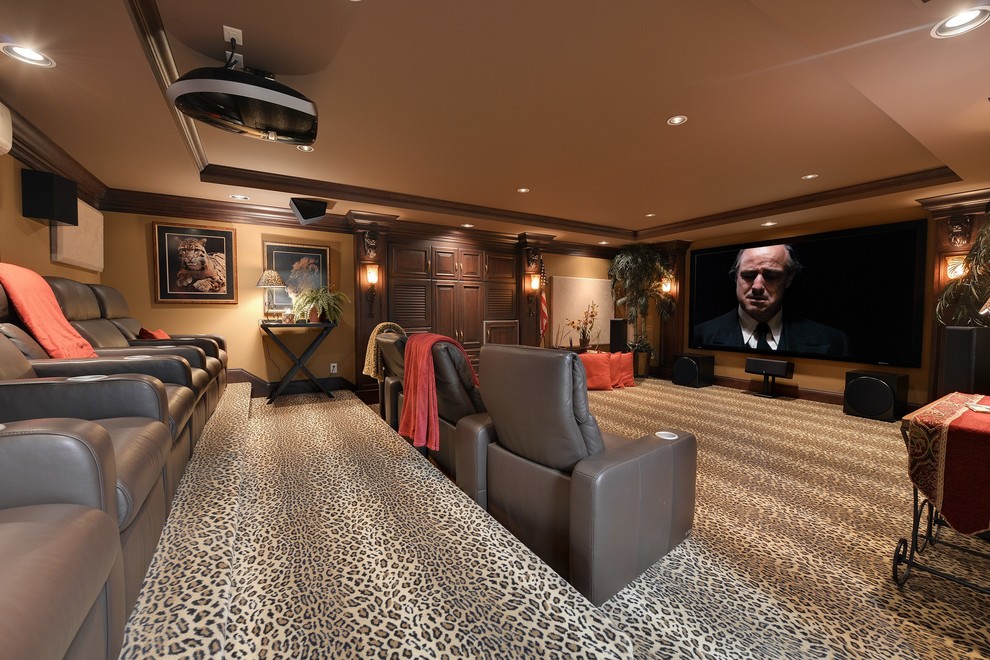 Design ideas for a large traditional enclosed home theatre in Minneapolis with carpet, a projector screen and yellow walls.
