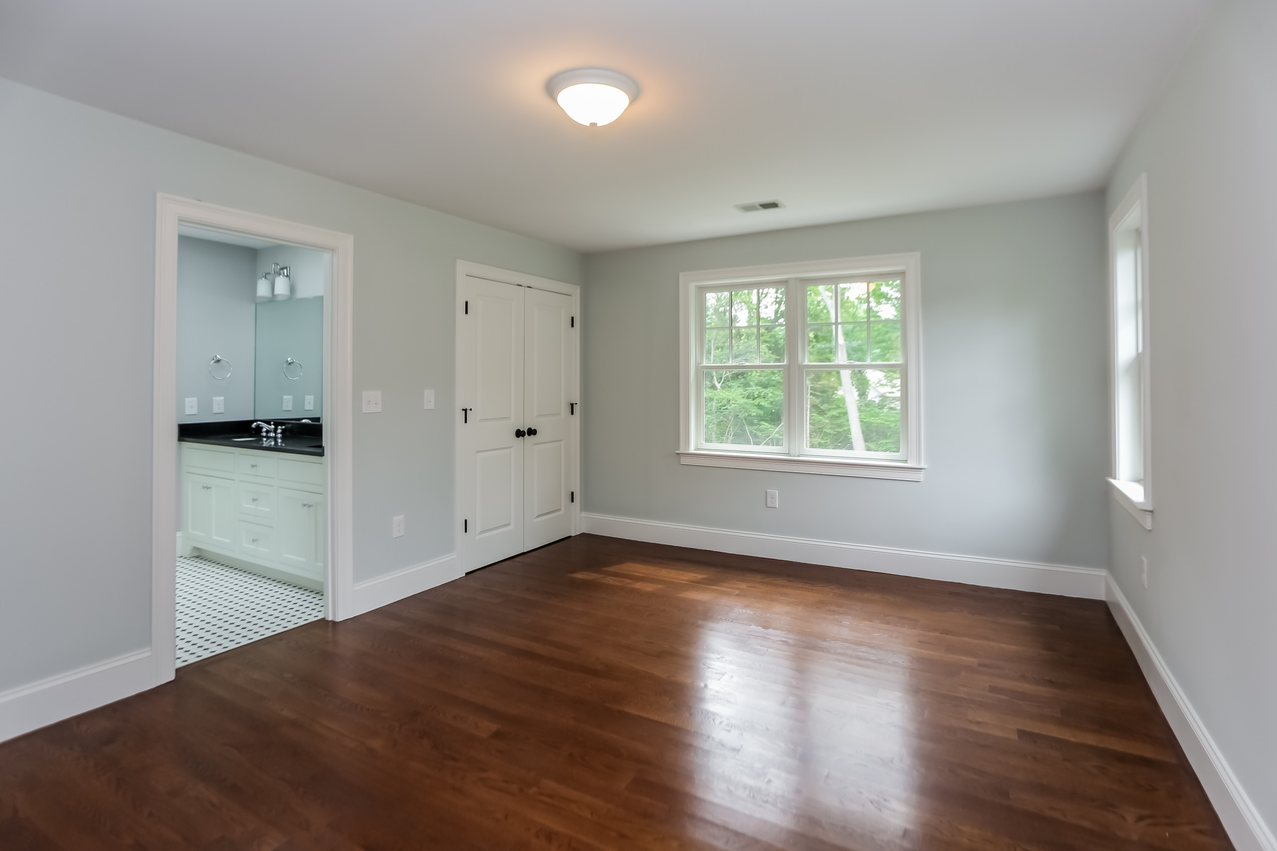 Bedroom with attached bathroom
