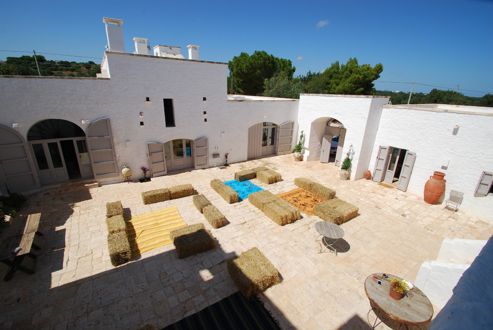Ispirazione per un patio o portico mediterraneo