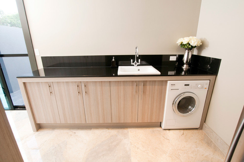 Contemporary laundry room in Brisbane.
