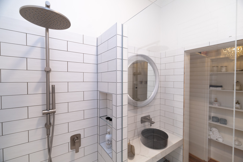 Photo of a small contemporary 3/4 bathroom in Sydney with a curbless shower, white tile, porcelain tile, white walls, porcelain floors, a vessel sink, tile benchtops, white floor, white benchtops, a shower seat and a single vanity.
