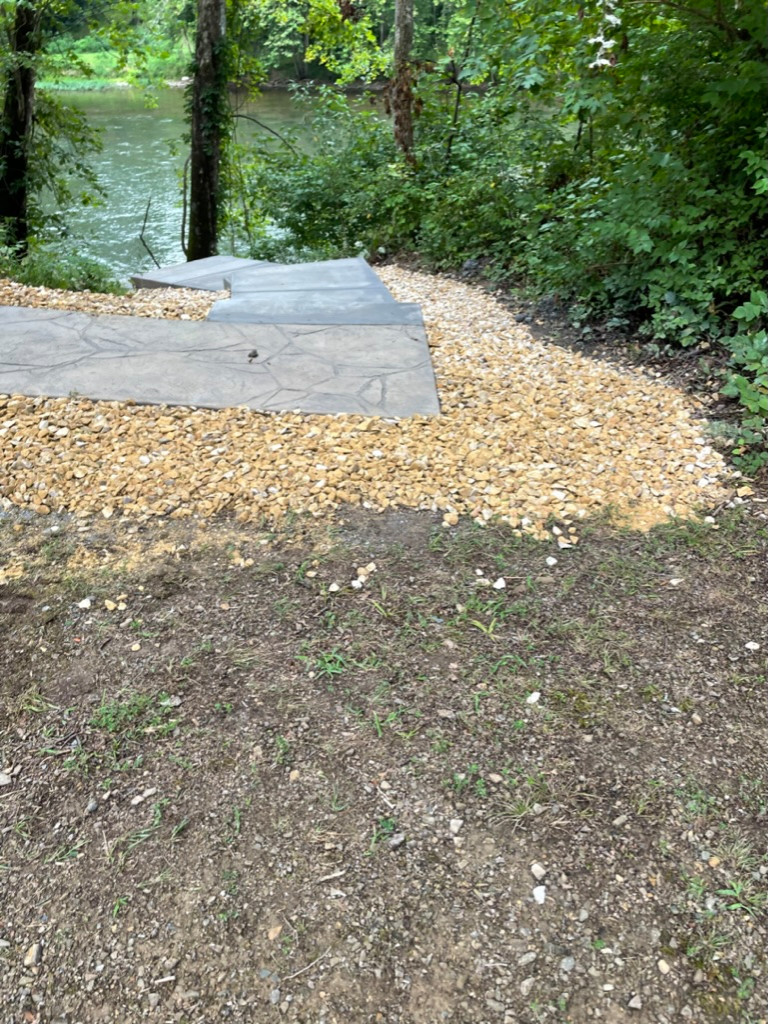 Elizabeths concrete stamp and steps to axess the river
