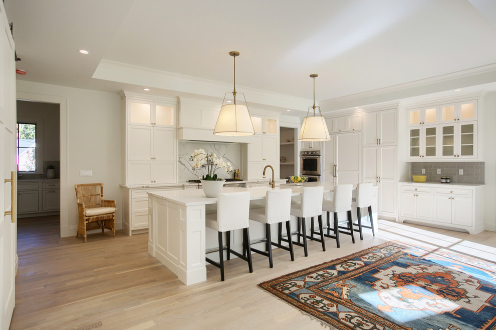 Example of a transitional home design design in Boston