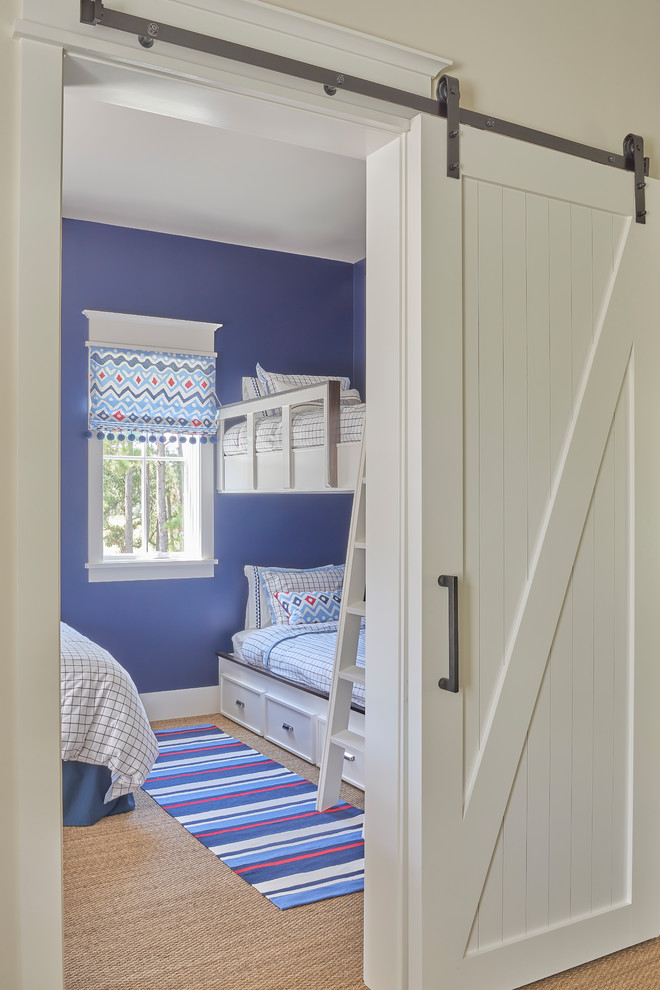 Design ideas for a mid-sized transitional guest bedroom in Charleston with blue walls, carpet, no fireplace and brown floor.