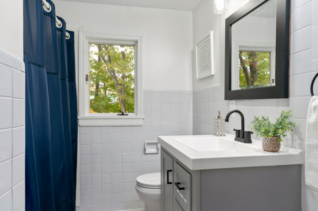 Warm Modernized Cape Cod bathroom