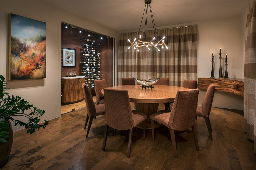 Inspiration for a large contemporary separate dining room in Phoenix with beige walls, medium hardwood floors and no fireplace.
