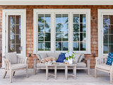 Beach Style Porch by Wettling Architects