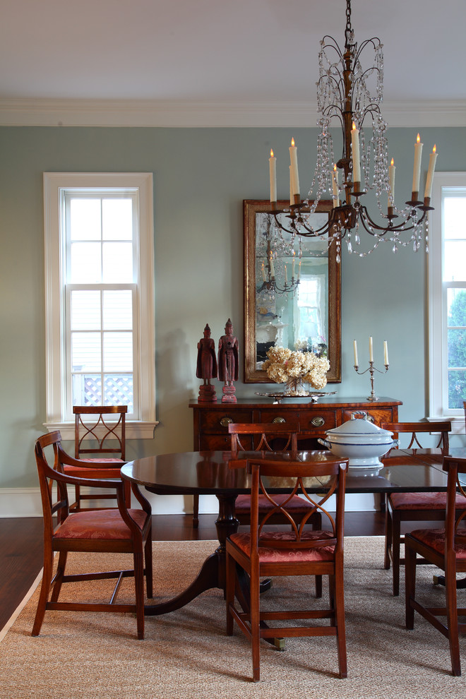 Photo of a traditional open plan dining in DC Metro with dark hardwood floors, blue walls and no fireplace.