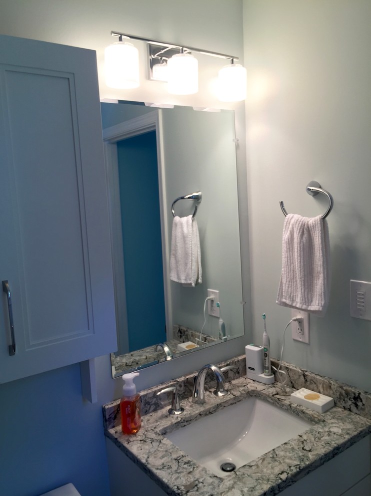 Inspiration for a small transitional master gray tile and porcelain tile porcelain tile alcove shower remodel in Baltimore with shaker cabinets, white cabinets, a two-piece toilet, green walls, an undermount sink and quartz countertops