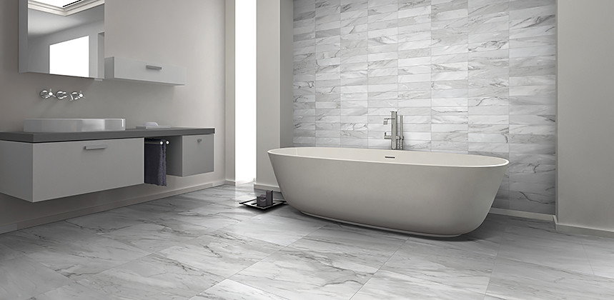 Inspiration for a mid-sized modern master bathroom in Toronto with flat-panel cabinets, grey cabinets, a freestanding tub, a one-piece toilet, gray tile, white tile, ceramic tile, grey walls, ceramic floors, a vessel sink and zinc benchtops.
