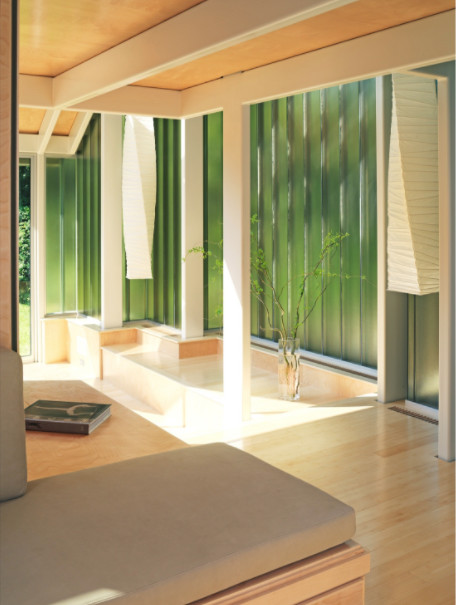 Inspiration for a mid-sized contemporary home yoga studio in Boston with beige walls, beige floor and bamboo floors.