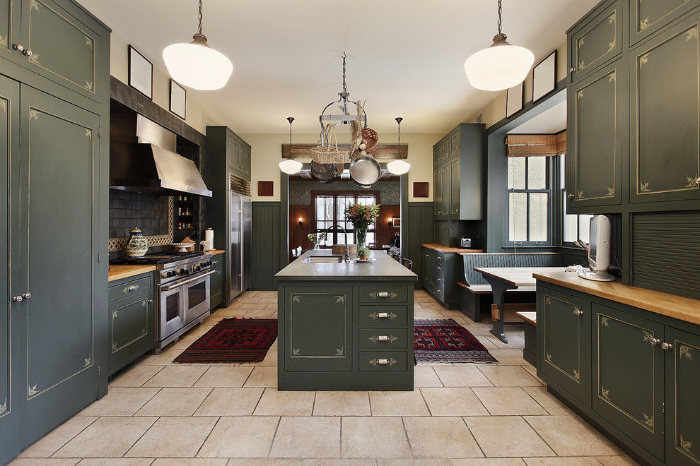 Photo of a country u-shaped eat-in kitchen in Grand Rapids with an undermount sink, shaker cabinets, green cabinets, grey splashback, stainless steel appliances, with island and beige floor.