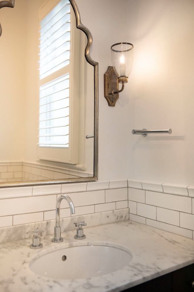 Design ideas for a large mediterranean 3/4 bathroom in Melbourne with furniture-like cabinets, a corner shower, a one-piece toilet, white tile, ceramic tile, white walls, cement tiles, an undermount sink, marble benchtops, multi-coloured floor, a hinged shower door, white benchtops, grey cabinets, a single vanity and a built-in vanity.