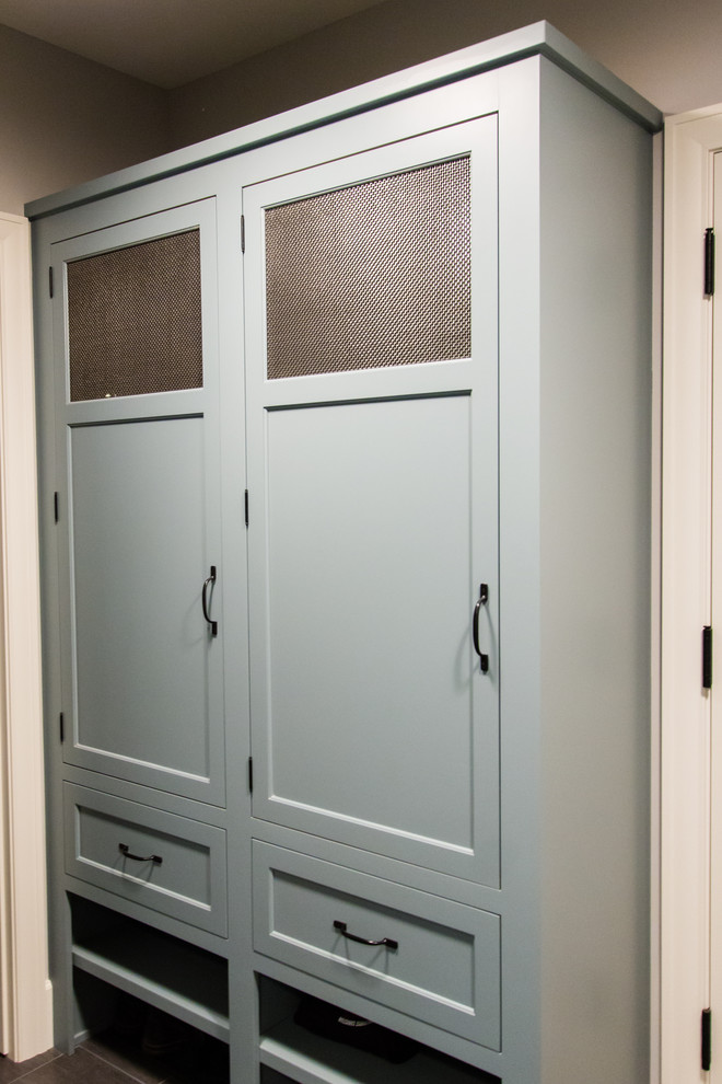 Mudroom - mid-sized transitional ceramic tile mudroom idea in Minneapolis with gray walls