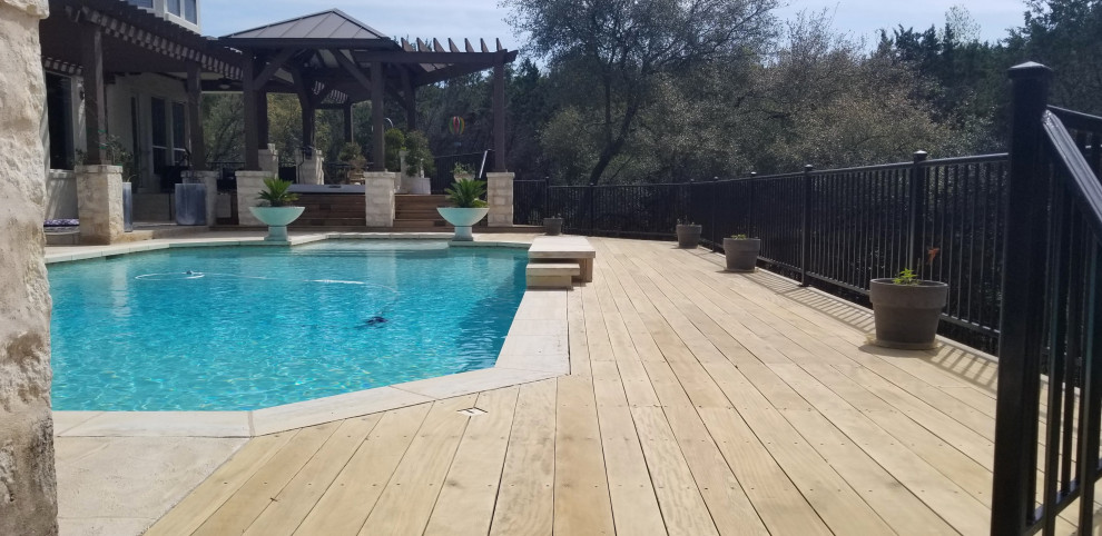 Deck - large transitional backyard deck idea in Austin
