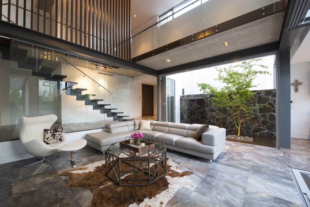 This is an example of a large contemporary living room in Sydney.