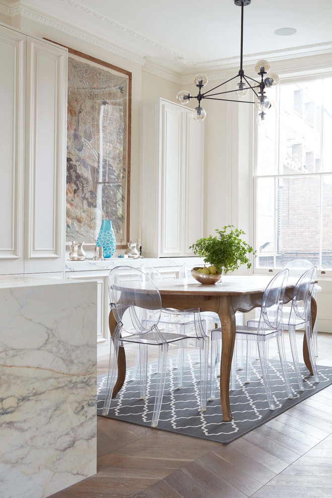Transitional dining room in London.