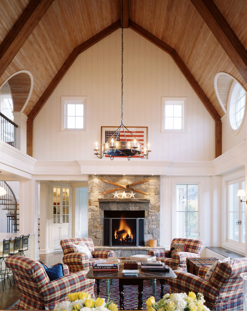 Inspiration for a traditional open concept living room in Bridgeport with white walls, a stone fireplace surround and no tv.