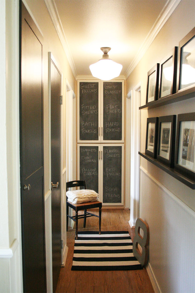 Inspiration for a mid-sized traditional hallway in Los Angeles with beige walls.