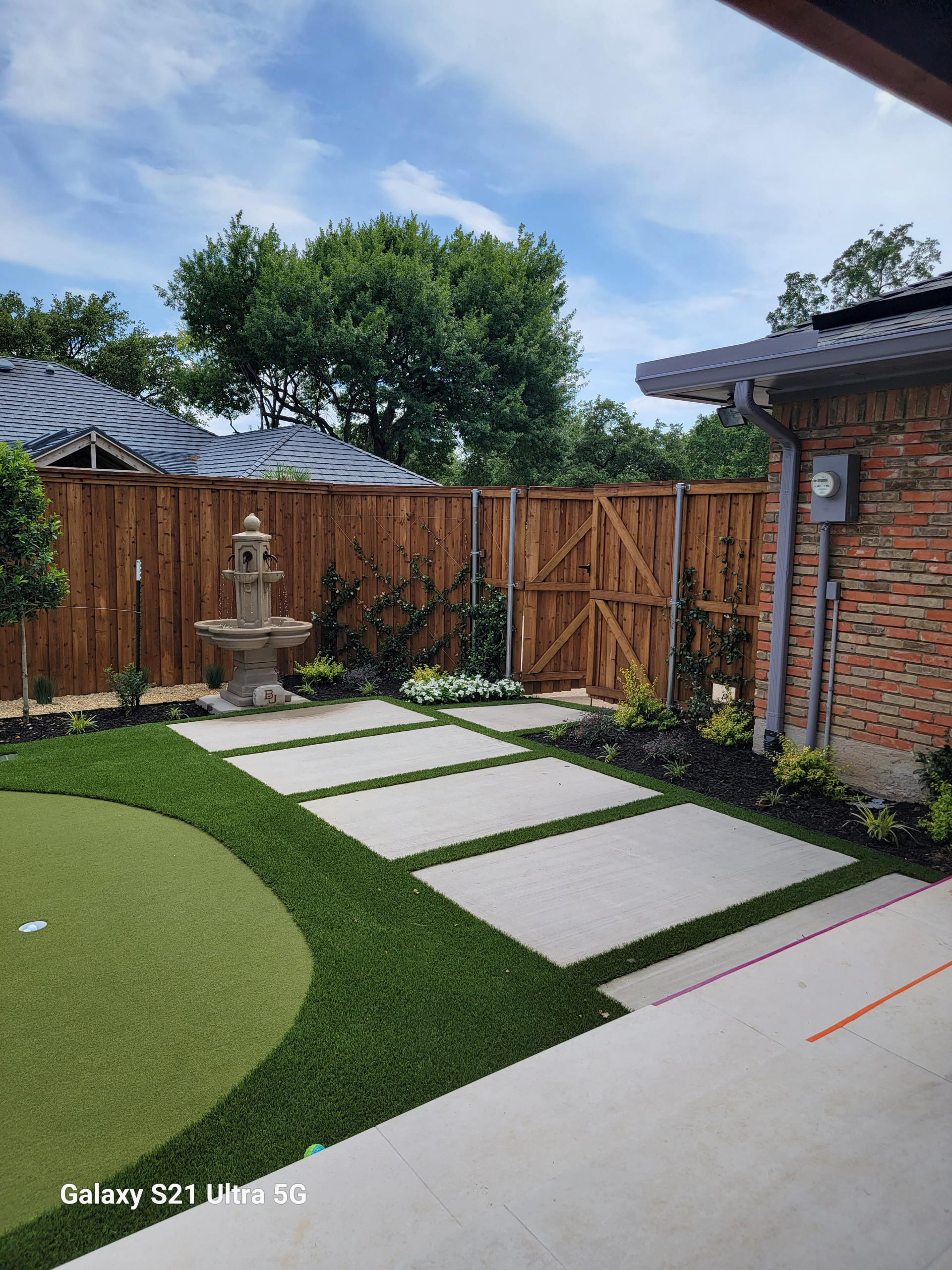 Middle Downs' Porch with putting green.