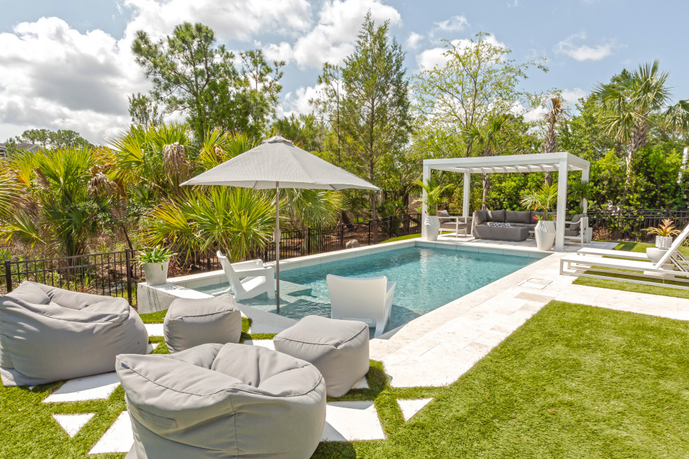 Design ideas for a contemporary swimming pool in Charleston with a shelter.