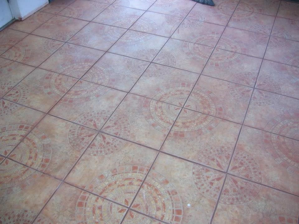 Example of a mid-sized ceramic tile front door design in Miami with white walls