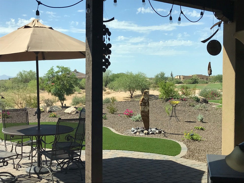 Home design - large eclectic home design idea in Phoenix
