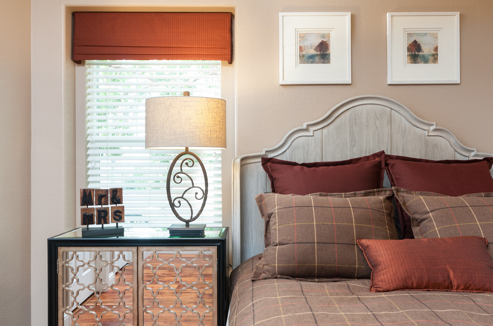 This is an example of a small transitional guest bedroom in San Francisco with dark hardwood floors and beige walls.