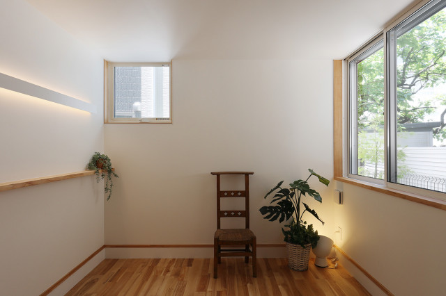 吹抜けで家族がつながる-野方の家 minimalistisch