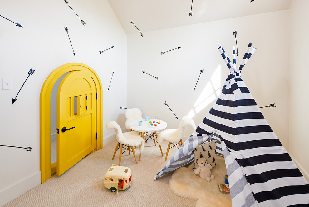 This is an example of a mid-sized scandinavian gender-neutral kids' playroom in Other with white walls and carpet.