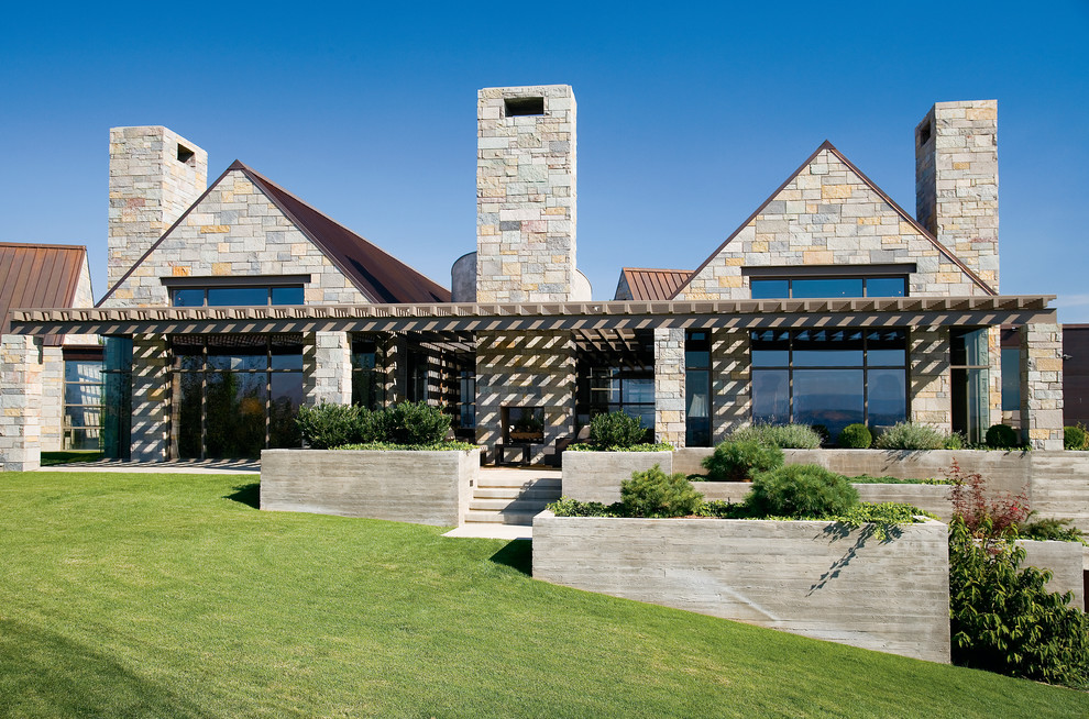Inspiration for a contemporary exterior in Seattle with stone veneer.
