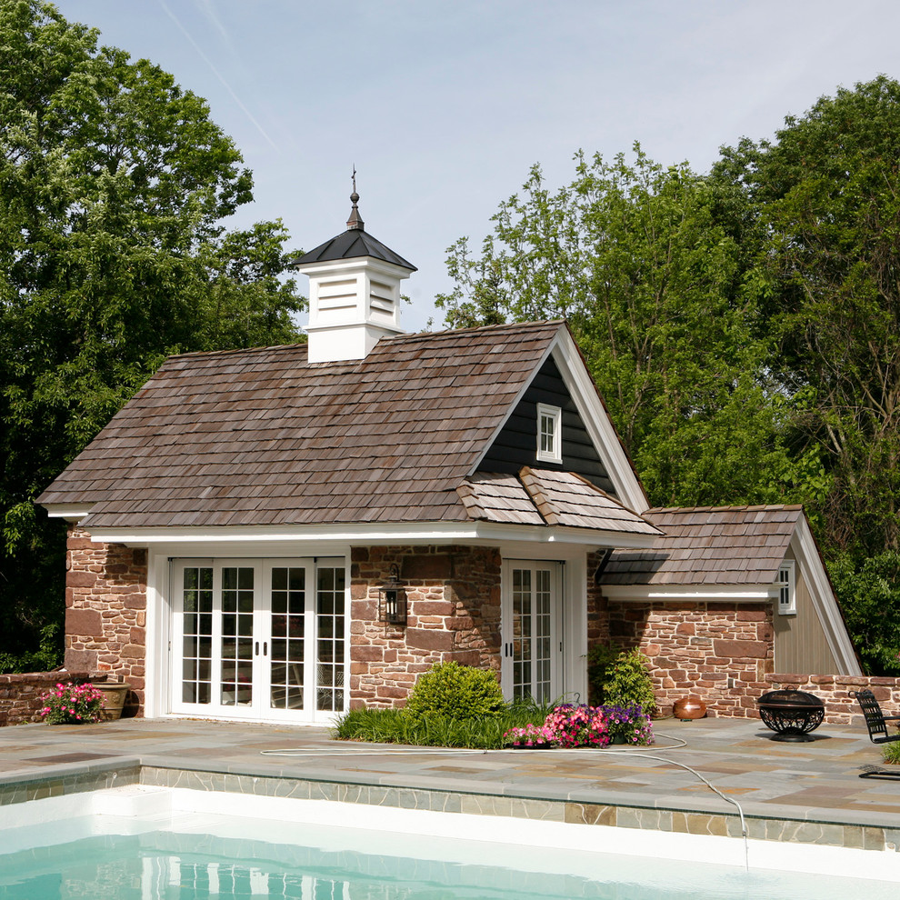 Inspiration for a traditional pool in Philadelphia with a pool house.
