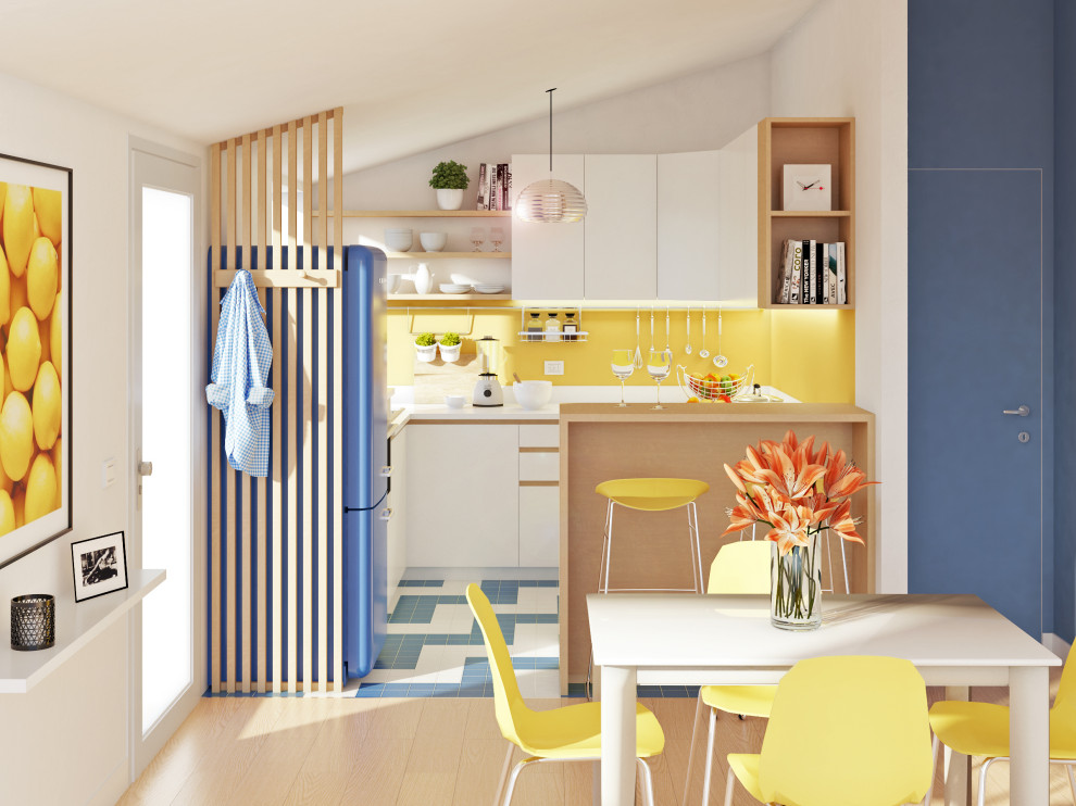 Design ideas for a small beach style l-shaped eat-in kitchen in Milan with a drop-in sink, flat-panel cabinets, white cabinets, laminate benchtops, white splashback, matchstick tile splashback, coloured appliances, ceramic floors, a peninsula, blue floor and white benchtop.