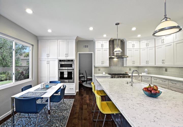 Example of a mid-sized transitional home design design in Orange County