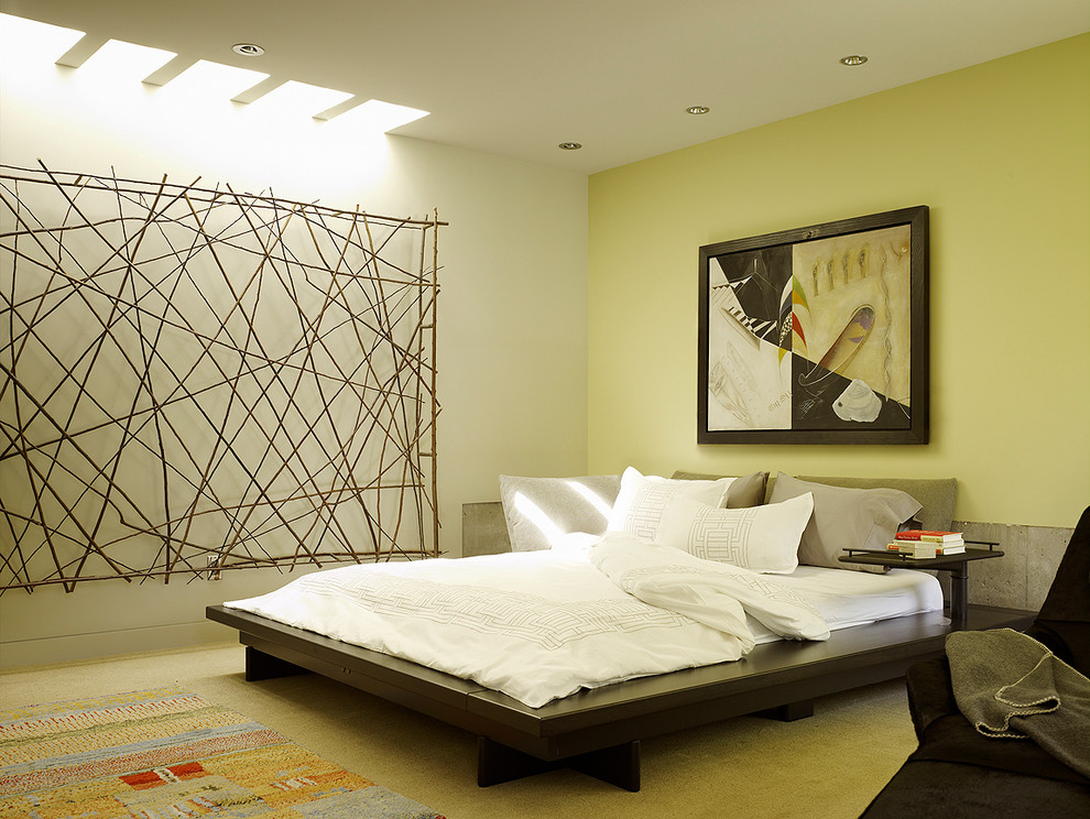Inspiration for a large asian guest bedroom in San Francisco with yellow walls.