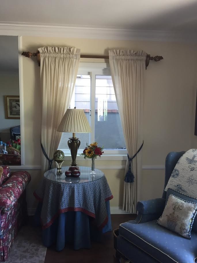 Example of a mid-sized classic formal and enclosed living room design in Orange County with beige walls, no fireplace and no tv