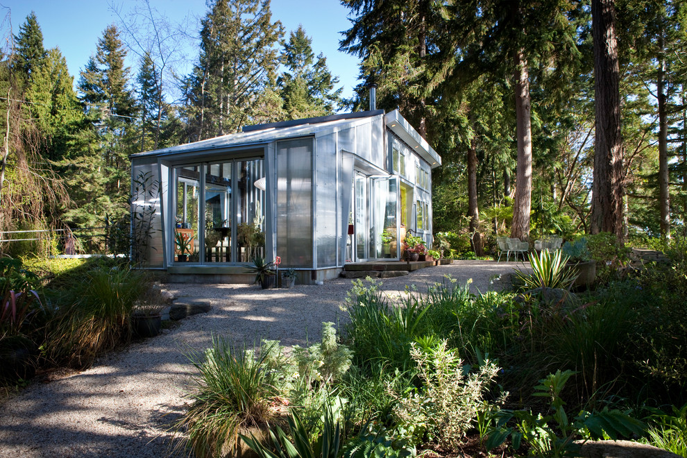 This is an example of a contemporary exterior in Seattle with metal siding.
