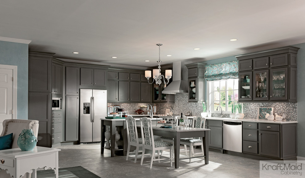 Design ideas for a large transitional l-shaped eat-in kitchen in Detroit with raised-panel cabinets, grey cabinets, stainless steel appliances and with island.