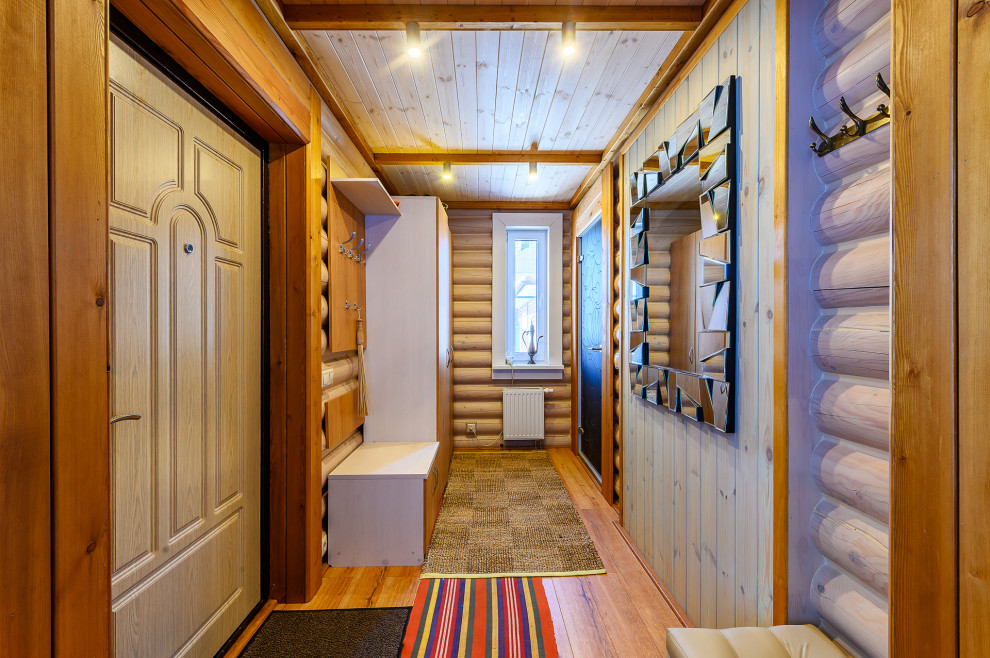 отделка дома из оцилиндрованного бревна