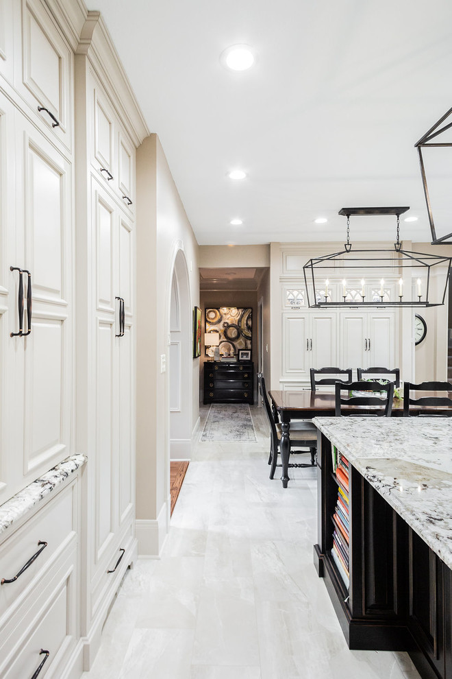 Kitchen - large transitional porcelain tile and beige floor kitchen idea with a farmhouse sink, beaded inset cabinets, gray cabinets, granite countertops, porcelain backsplash, stainless steel appliances, an island and beige countertops