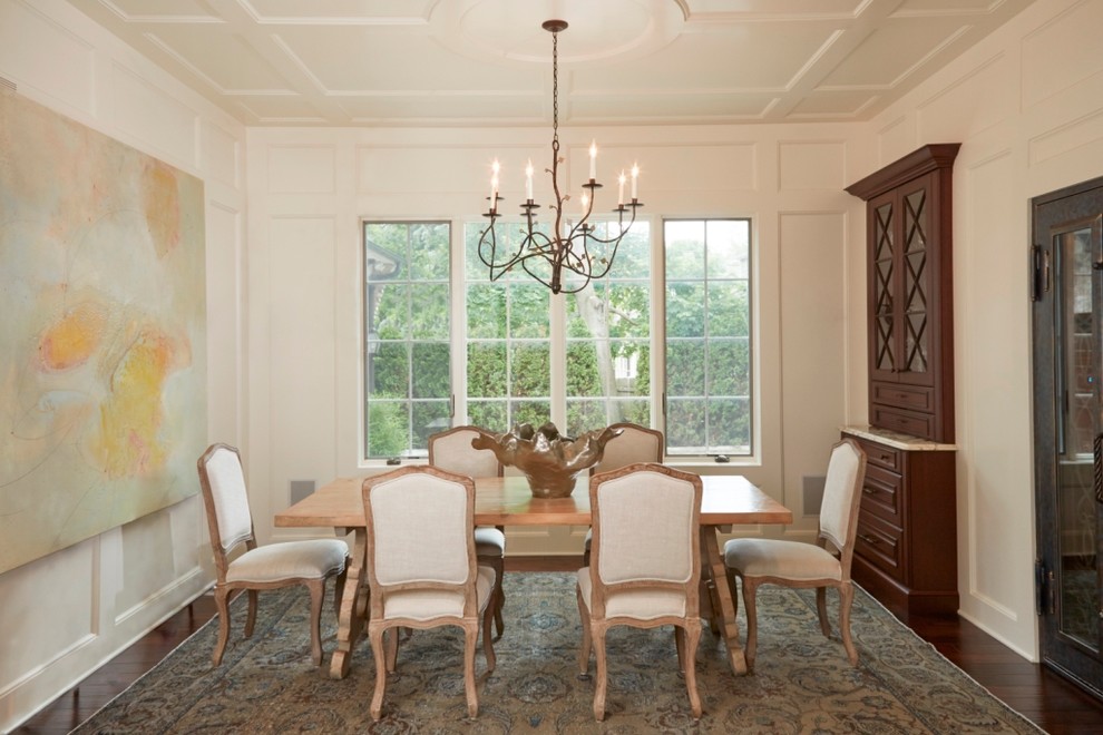 Traditional dining room in Detroit with white walls, dark hardwood floors and no fireplace.