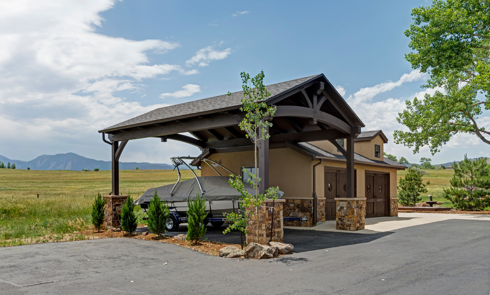 Boathouse - large traditional detached two-car boathouse idea in Denver