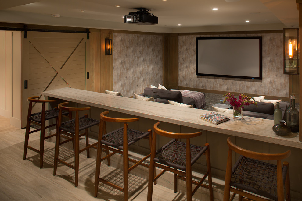 Transitional enclosed home theatre in San Diego with light hardwood floors and a projector screen.