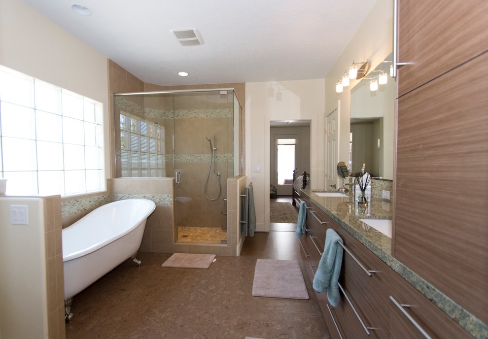 Photo of a large contemporary master bathroom in Boise with an undermount sink, flat-panel cabinets, brown cabinets, granite benchtops, a claw-foot tub, a corner shower, a two-piece toilet, multi-coloured tile, ceramic tile, white walls and cork floors.